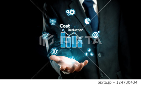 Businessman Presenting Digital Graphs for Cost Reduction Strategies in a Professional Setting with Icons and Data Visualizations. Qubit 124730434