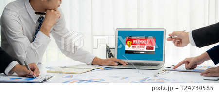 Virus warning alert on computer screen detected brisk cyber threat 124730585
