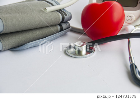 A stethoscope and a red heart shaped with customizable space for text. Medical and health concept 124731579