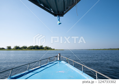 View of Bueng Khong Long the largest frehwater reservoir in Bueng Kan province of Thailand seen from tourist boat.  124733302