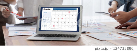 Calendar on computer software application for brisk schedule planning Calendar on computer software application for brisk schedule planning 124733896