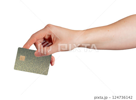 Card in hand. Client showing plastic bank credit and debit object with chip, green and yellow Card in hand. Client showing plastic bank credit and debit object with chip, green and yellow 124736142