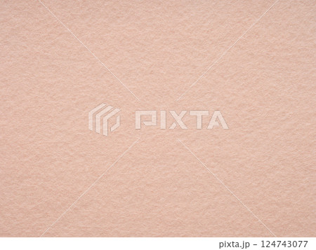 Soft peach hue felt texture with a minimalist, soothing touch 124743077