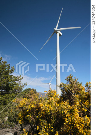 Wind turbine with blue sky at background Wind turbine with blue sky at background 124744354