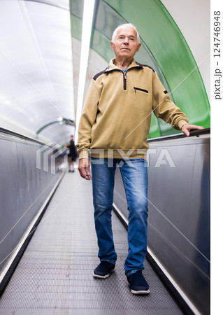 European old man going down to subway 124746948