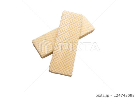 A wafer biscuit sticks isolated on a white background. A wafer biscuit sticks isolated on a white background. 124748098