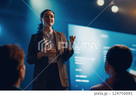 woman is speaking about technologies woman is speaking about technologies 124750091