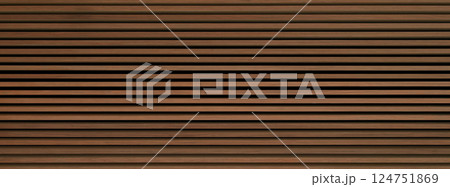 Long panoramic wooden background banner - brown wooden acoustic panels wall texture seamless pattern horizontal. 124751869