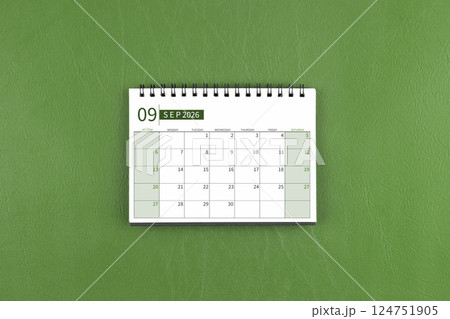 September 2026 Monthly desk calendar on green leather background. September 2026 Monthly desk calendar on green leather background. 124751905