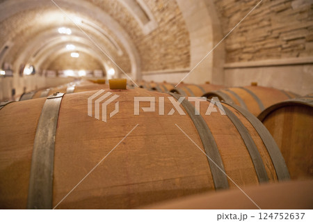 Wine barrels in the cellar of wine producer. Wine barrels in the cellar of wine producer. 124752637