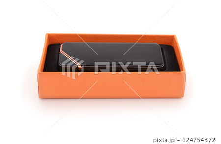 Cigarette lighter in gift box isolated on white. 124754372