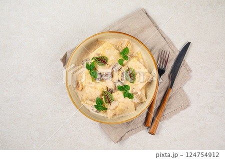 Portion of gourmet ravioli with cream sauce Portion of gourmet ravioli with cream sauce 124754912