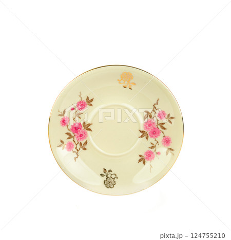 Porcelain vintage plate isolated on white background. Porcelain vintage plate isolated on white background. 124755210