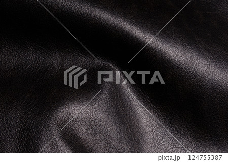 Black leather pattern. Top view. Black leather pattern. Top view. 124755387