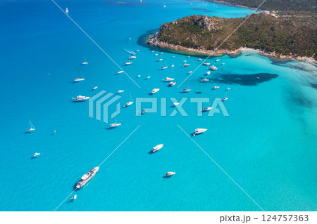 Aerial view of luxury yachts and boats on blue sea at sunny day Aerial view of luxury yachts and boats on blue sea at sunny day 124757363