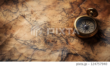 Exploring the Ancient Navigation Tools Displayed on a Vintage Map in Soft Lighting Exploring the Ancient Navigation Tools Displayed on a Vintage Map in Soft Lighting 124757940