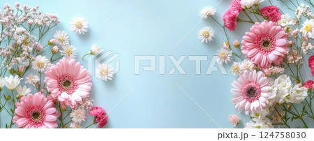 Beautiful Arrangement of Pink and White Flowers in a Soft Blue Setting for Decoration Beautiful Arrangement of Pink and White Flowers in a Soft Blue Setting for Decoration 124758030