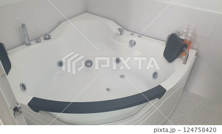 Jacuzzi bathtub interior in bathroom Jacuzzi bathtub interior in bathroom 124758420