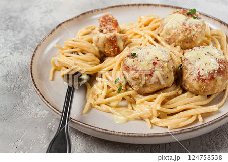 spaghetti with chicken meatballs, with cream sauce, and parmesan cheese, and decorated with microgreens, homemade, no people, 124758538