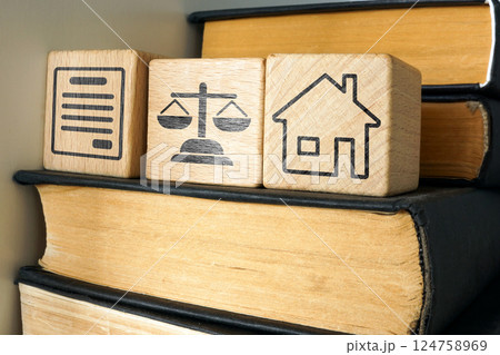 Book and symbols of court and real estate. Inheritance law and property rights. 124758969