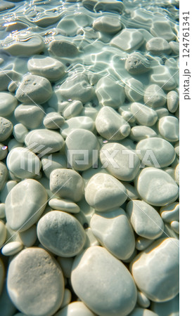 Marine white pebbles underwater. 124761341