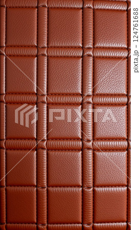 The surface texture of artificial leather is brown, stitched in the form of diamonds, squares, rectangles. Quilted eco-leather. The surface texture of artificial leather is brown, stitched in the form of diamonds, squares, rectangles. Quilted eco-leather. 124761688