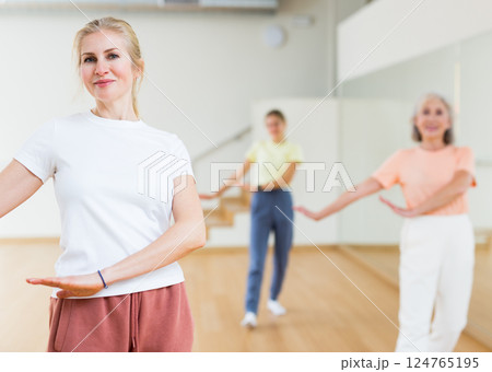 Woman dancing during group class 124765195