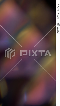 Illuminated leak. Blur flare texture. Defocused pink purple yellow multicolor rainbow light on abstract art dark black background. Illuminated leak. Blur flare texture. Defocused pink purple yellow multicolor rainbow light on abstract art dark black background. 124766727