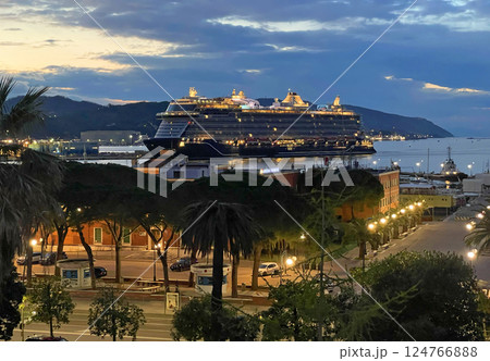 Cruise ship sails into port at dawn in La Spezia, Italy. Vacation and tourism. Vacation and travel by sea. Cruise ship sails into port at dawn in La Spezia, Italy. Vacation and tourism. Vacation and travel by sea. 124766888