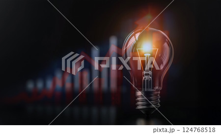 背景に株式チャートがある電球アイデアの創造的コンセプト 背景に株式チャートがある電球アイデアの創造的コンセプト 124768518