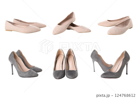 Display of stylish flat and heeled shoes in neutral colors, isolated on white 124768612