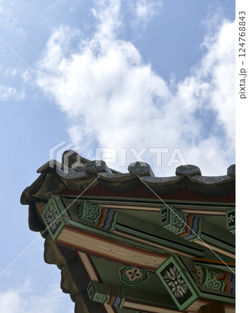 The quiet shadows and natural textures of hanok invite you into a space of peace and nostalgia. 124768843