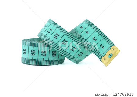 A curled turquoise measuring tape isolated on white, used for precise measurements in sewing. A curled turquoise measuring tape isolated on white, used for precise measurements in sewing. 124768919