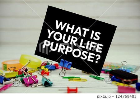 What Is Your Life Purpose? text on paper card with stationary on wooden background 124769483