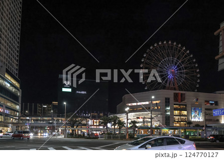 March 22 2025 Cityscape Featuring Ferris Wheel and Brightly Lit Urban, Japan March 22 2025 Cityscape Featuring Ferris Wheel and Brightly Lit Urban, Japan 124770127