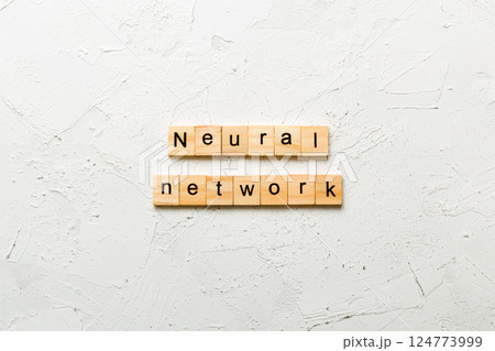 NEURAL NETWORK word written on wood block. NEURAL NETWORK text on cement table for your desing, concept 124773999