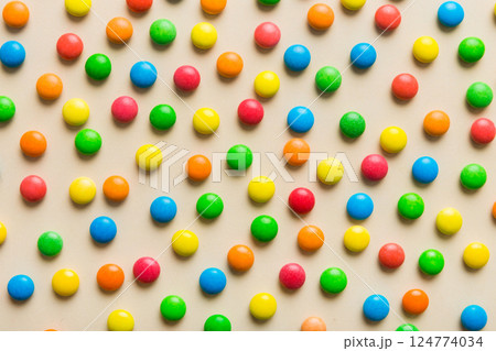 colorful candies as background top view. Seamless pattern with candy. Many sweet candies close-up 124774034