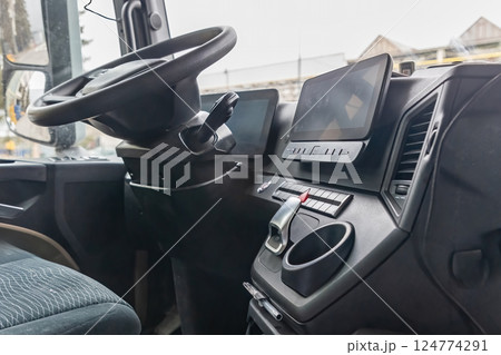 Lower angle closeup view of  empty cabin of a  truck. Lower angle closeup view of  empty cabin of a  truck. 124774291