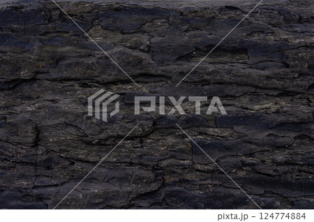 Texture of smooth black rock 124774884