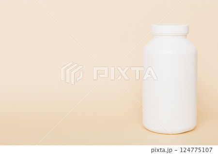 supplement pills with medicine bottle health care and medical top view. Vitamin tablets. Top view mockup bottle for pills and vitamins with green leaves, natural organic bio supplement, copy space supplement pills with medicine bottle health care and medical top view. Vitamin tablets. Top view mockup bottle for pills and vitamins with green leaves, natural organic bio supplement, copy space 124775107