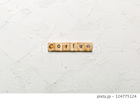 coffee word written on wood block. coffee text on table, concept 124775124