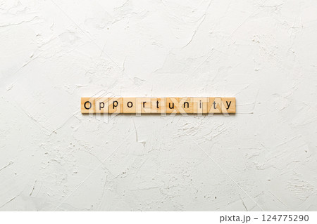 Opportunity word written on wood block. Opportunity text on table, concept Opportunity word written on wood block. Opportunity text on table, concept 124775290
