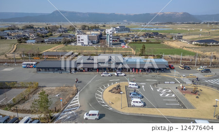 March 25 2025 Rail Station with Fields and Mountains in the Background, Japan 124776404