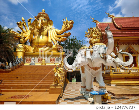 Gold ganecha with thousand hands and elephant statues, Sa Kaeo 124776737