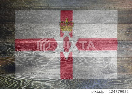 Northern Ireland flag on rustic old wood background 124779922