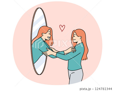 Woman hugs own reflection in mirror demonstrating narcissism and high self-esteem 124781344