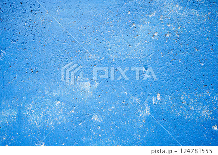 Blue painted concrete wall background. 124781555