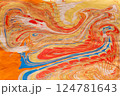 Illustrated orange, red and blue picture made by child painting on water in ebru style 124781643