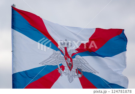 The flag of the Ministry of Defense of the Russian Federation is flying in the wind against a cloudy sky. The flag of the Ministry of Defense of the Russian Federation is flying in the wind against a cloudy sky. 124781878