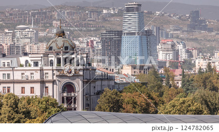 The glass tower of hotel in Tbilisi aerial timelapse, skyscrapers of Georgia The glass tower of hotel in Tbilisi aerial timelapse, skyscrapers of Georgia 124782065